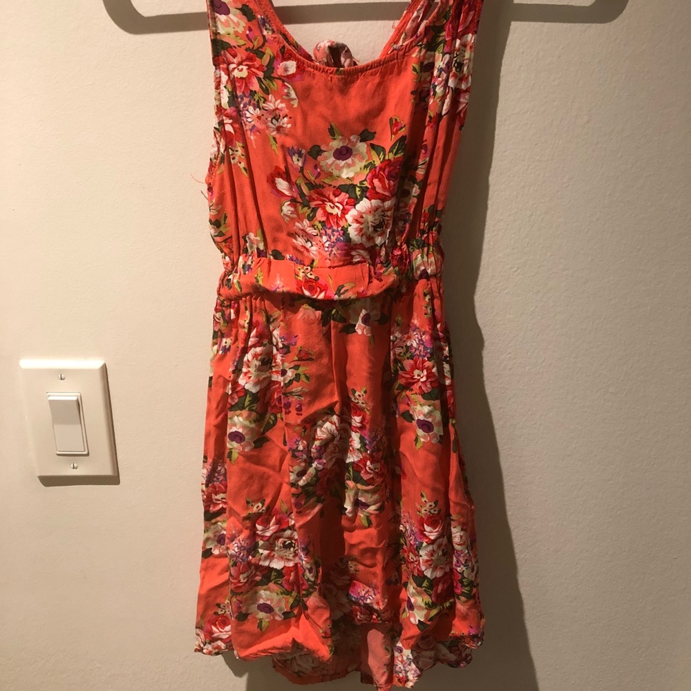 Coral dress with open back. Perfect for summer